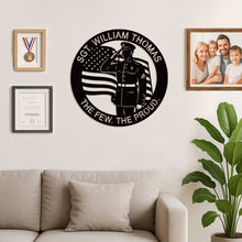 Custom military tribute metal sign with saluting Marine and American flag design, personalized veteran wall plaque made from powder-coated steel.