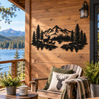 Black metal mountain and deer wall art displayed on a wooden lake house porch overlooking the water and mountains.