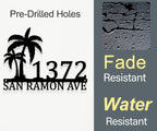 Custom metal palm tree address sign with house number and street name in black powder-coated steel, wall-mounted design