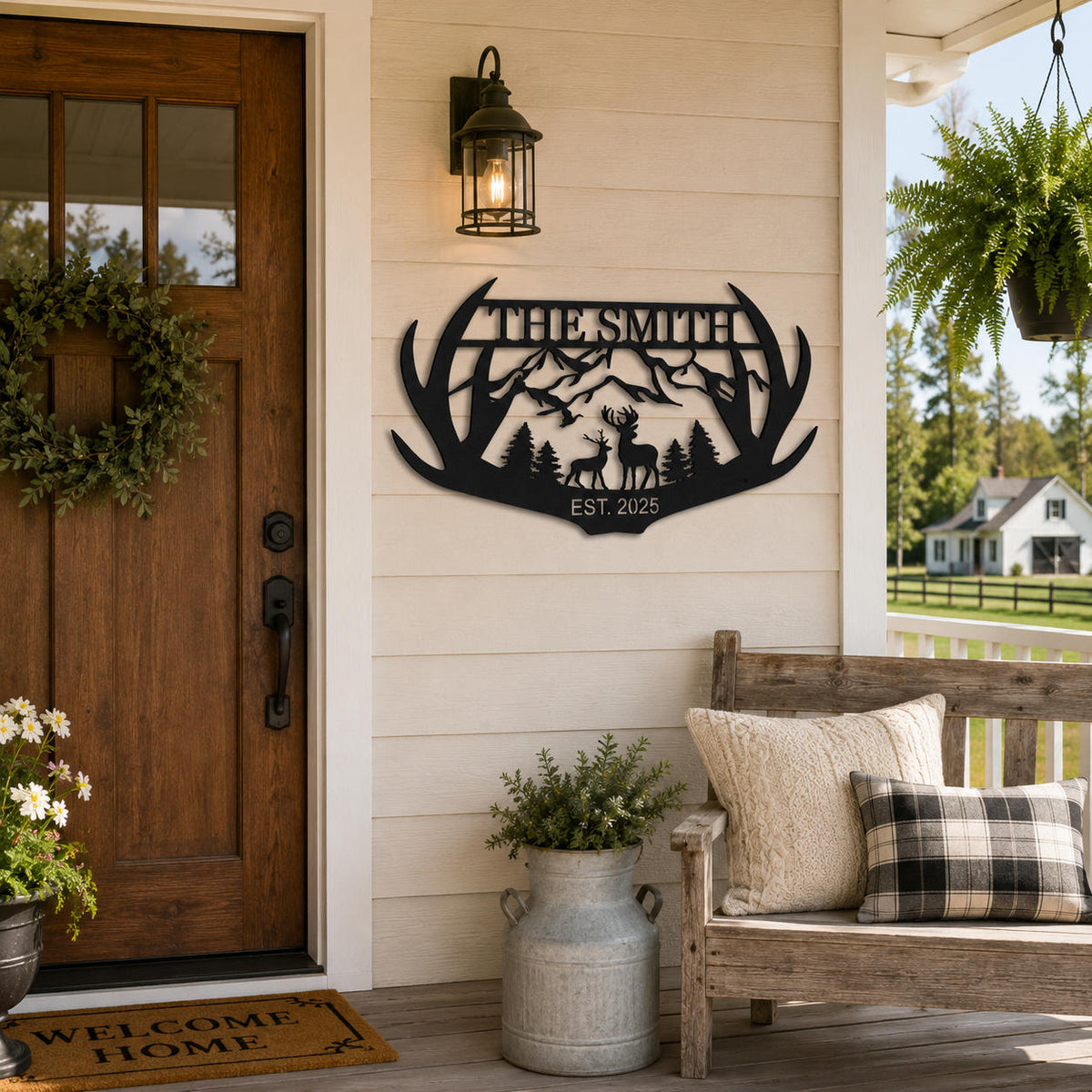 Personalized antler metal family sign displayed beside the front door of a rustic American farmhouse porch.
