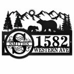Personalized black metal bear and mountain address sign with family name, house number and street name.