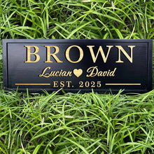 Personalized carved pine wood sign with custom engraved family name and rustic wall décor design