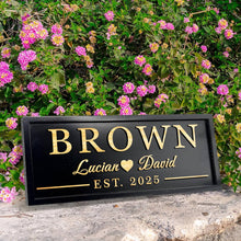 Personalized carved pine wood sign with custom engraved family name and rustic wall décor design