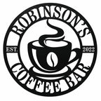 Personalized round black metal coffee bar sign featuring Robinson’s, EST. 2022, and a steaming coffee cup on a white background.