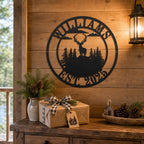 Personalized Deer Family Name Metal Sign mounted in a cozy cabin housewarming gift setting.