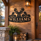 Personalized Williams deer metal sign displayed on a rustic American cabin porch.