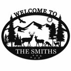Personalized mountain deer metal welcome sign with custom family name, black powder-coated steel wall decor for cabin, farmhouse, or outdoor entrance.
