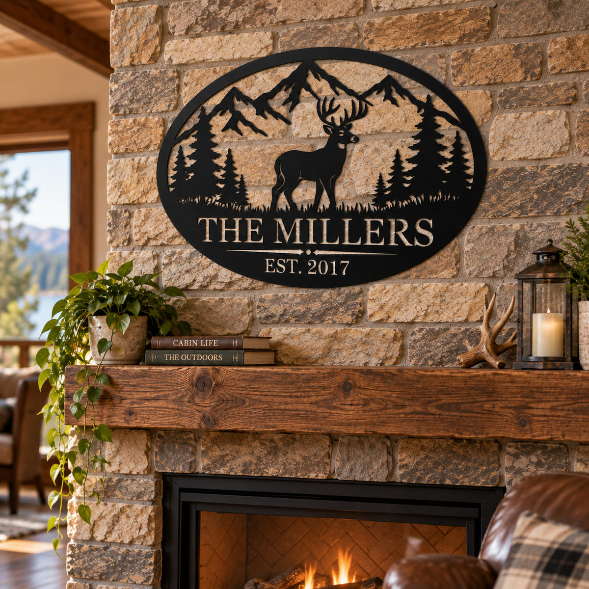 Personalized deer and mountain metal family sign displayed above a rustic stone fireplace in a cozy cabin.