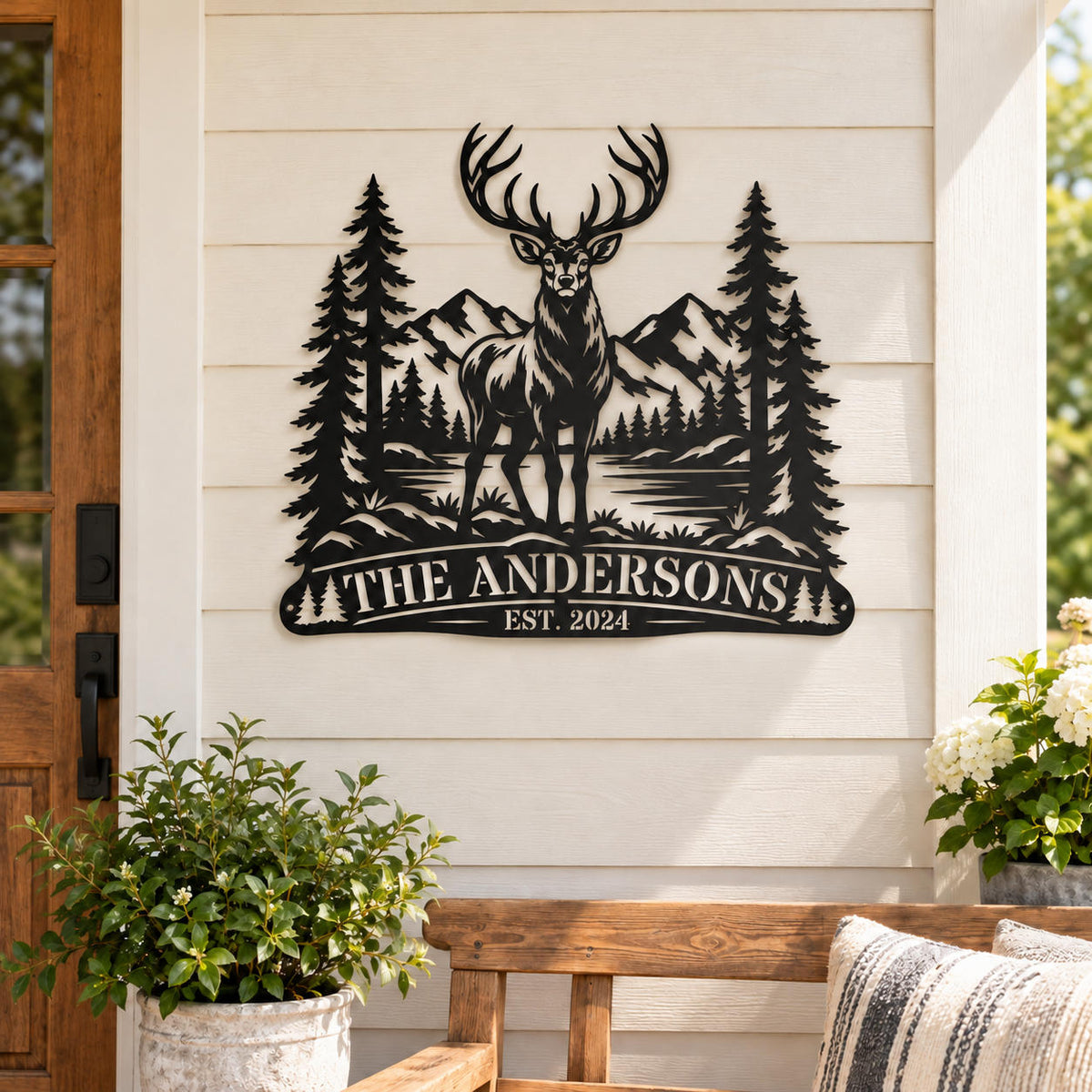 Custom elk family metal sign displayed on a farmhouse porch with white siding and rustic decor.