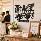Personalized family monogram metal sign with custom surname and established year displayed as a wedding or anniversary gift.