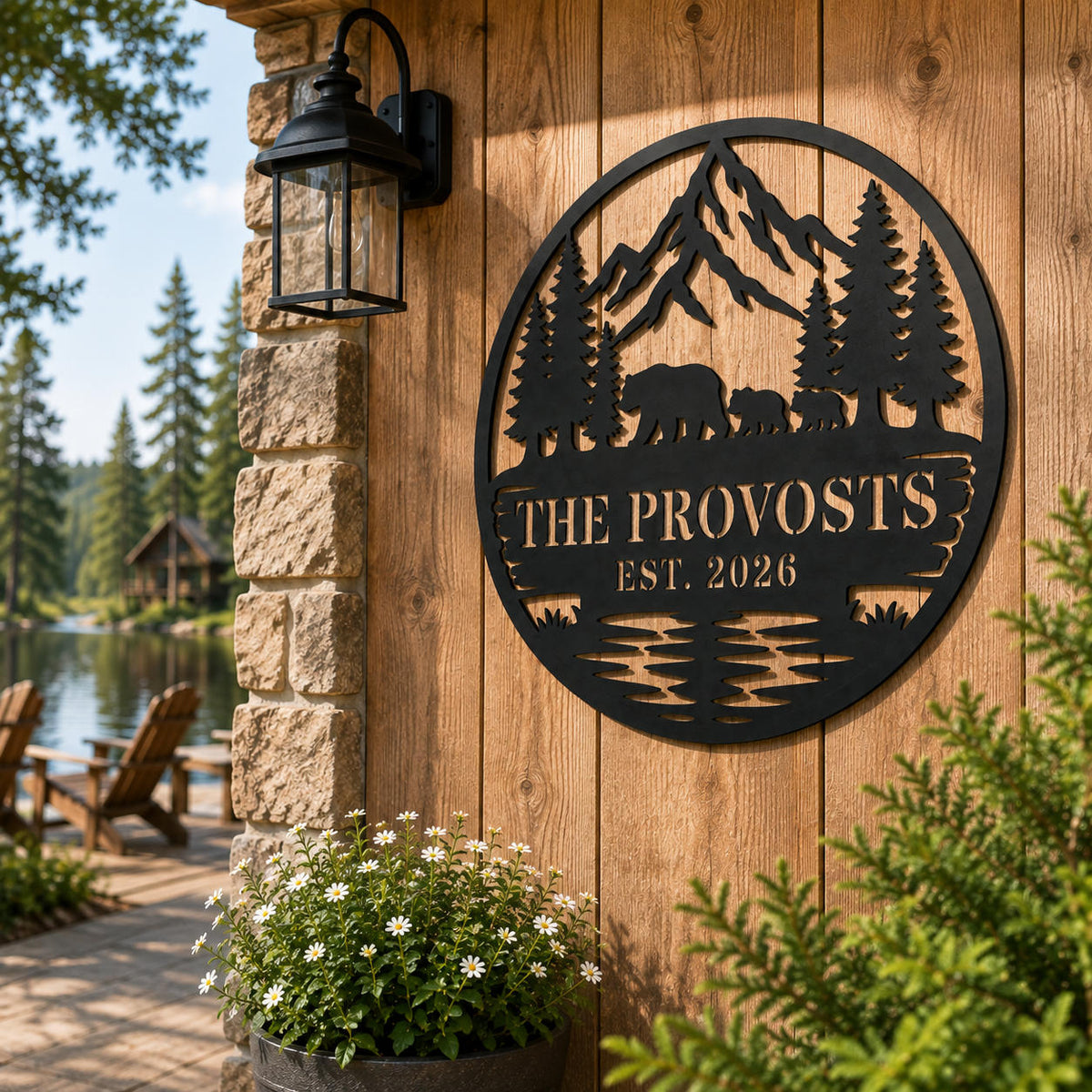 Personalized round bear family metal sign displayed outside a bright lakeside home with natural outdoor scenery.