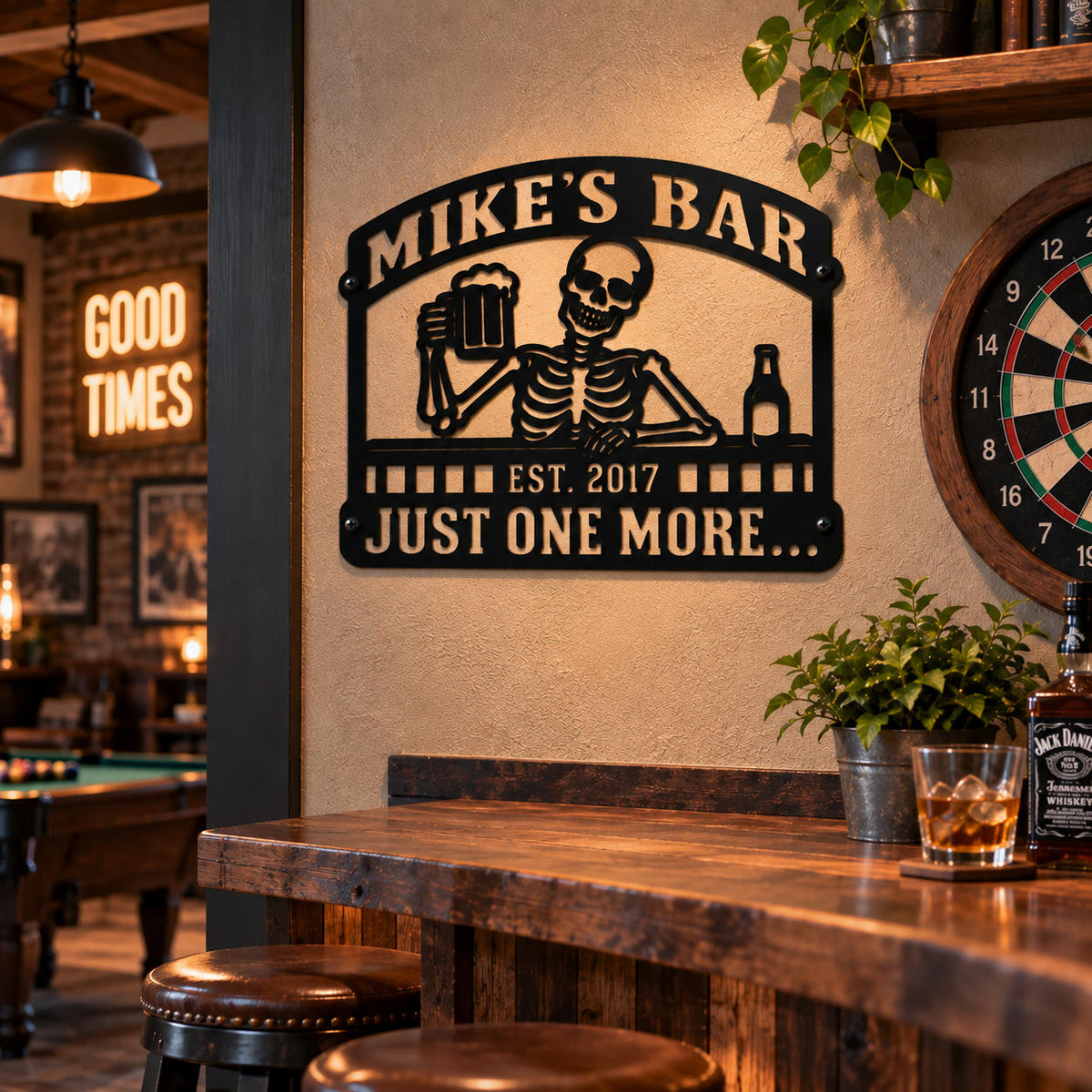 Personalized skeleton metal bar sign mounted in a rustic man cave with a pool table, dartboard, and home bar.