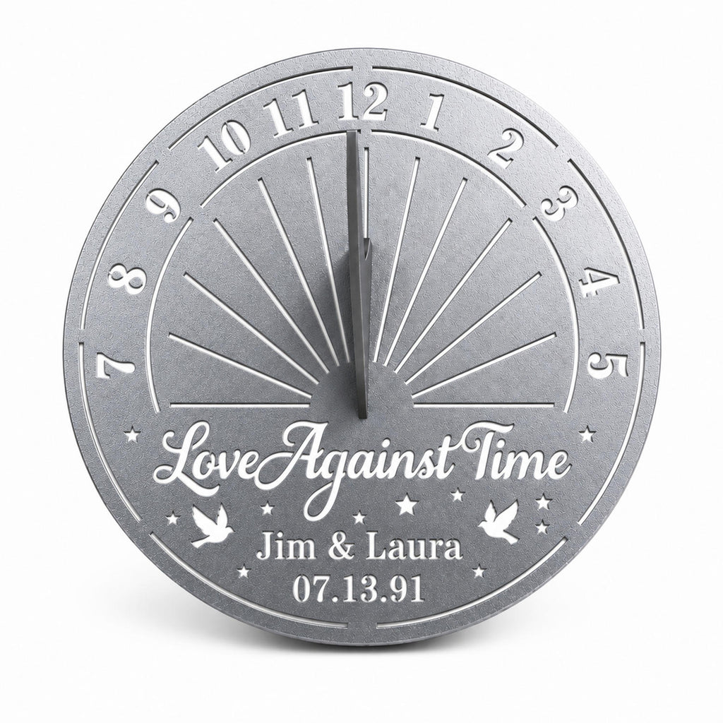 Personalized silver metal sundial featuring custom names, special date, and decorative sundial design on a white background.