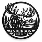 Personalized black metal moose sign featuring the Anderson family name, mountain, pine forest and lake design.