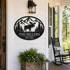 Personalized moose family metal sign displayed on a white American front porch wall.
