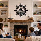 Personalized nautical metal wall sign displayed above a fireplace in a coastal style living room.