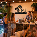Personalized metal pool sign decorating an outdoor pool bar during a backyard pool party, custom tropical pool wall decor.