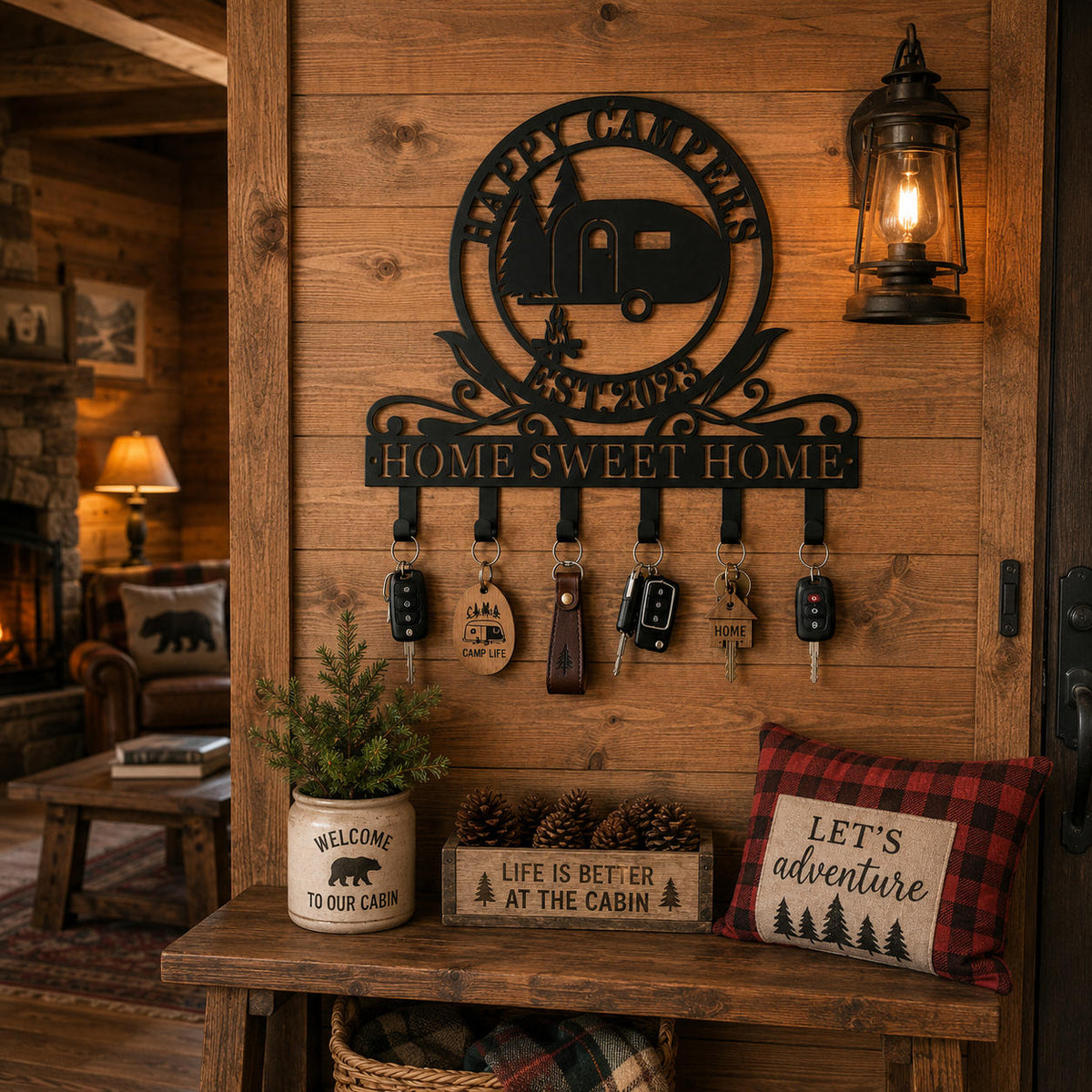 Custom camper metal key holder displayed on a rustic cabin wall with warm wood décor and cozy lighting.