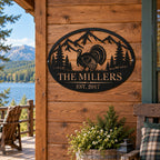 Personalized turkey family metal sign mounted on a rustic lakeside cabin with mountain and woodland surroundings.