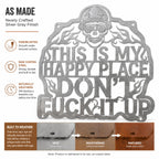Newly made silver gray corten steel biker skull sign before natural rust patina develops