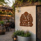 Corten steel biker skull metal sign decorating an outdoor patio and backyard entertainment area