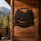 Custom metal cabin sign installed on a rustic log cabin exterior featuring personalized family name, mountain landscape, and evergreen forest design.