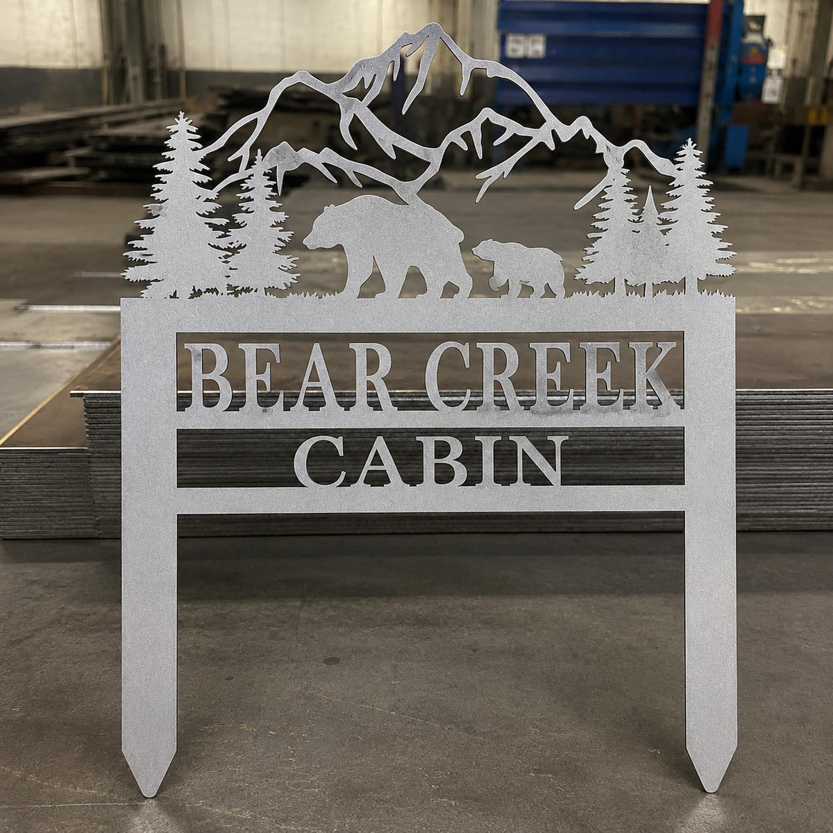 Freshly sandblasted weathering steel custom yard sign with a matte gray finish before natural rust patina develops.
